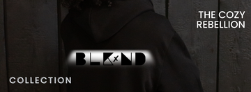 Person wearing a black hoodie with the BLKxND logo. Text reads “The Cozy Rebellion.” Collection banner for sensory-friendly graphic tees, hoodies, and sweatshirts.