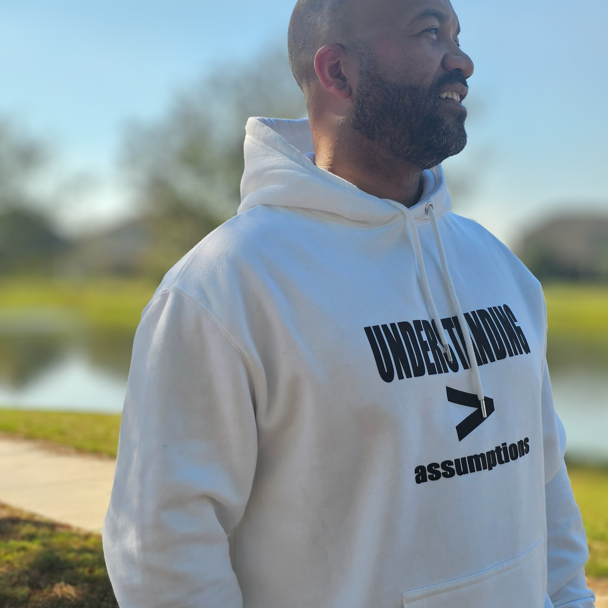 Understanding > Assumptions Hoodie